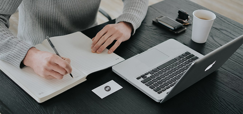 Image of a guy taking notes